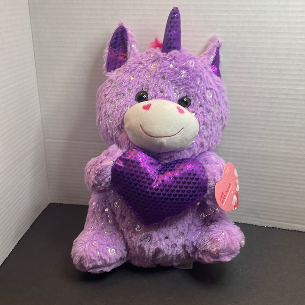 Unicorn purple stuffed animal with heart